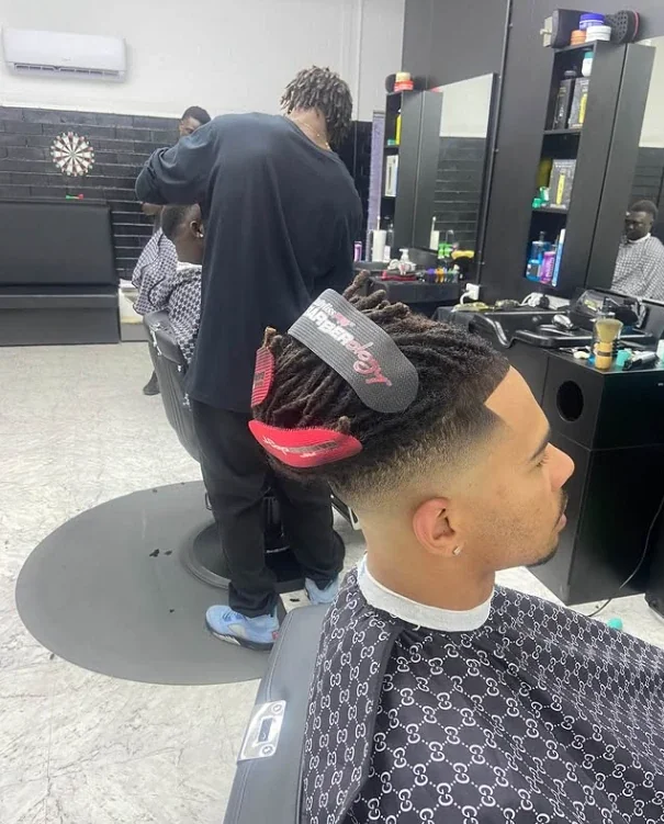 Dreadlock top with taper fade
