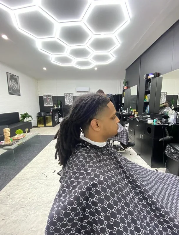 Dropped fade with dreadlocks